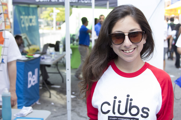 Become more involved at school - Join or create a club photo: Natalia Zuniga supports clubs on campus at St. James street fair on Sept. 4