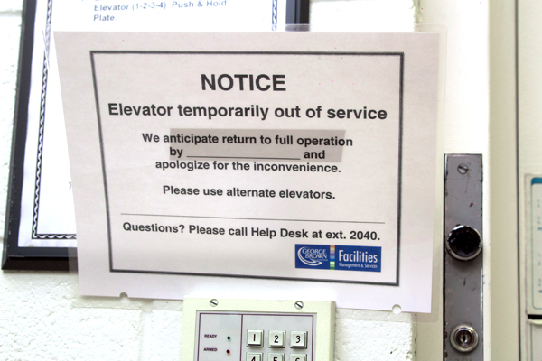Photo of undated out-of-service notice on elevator at St. James photo: Michael Nguyen/The Dialog