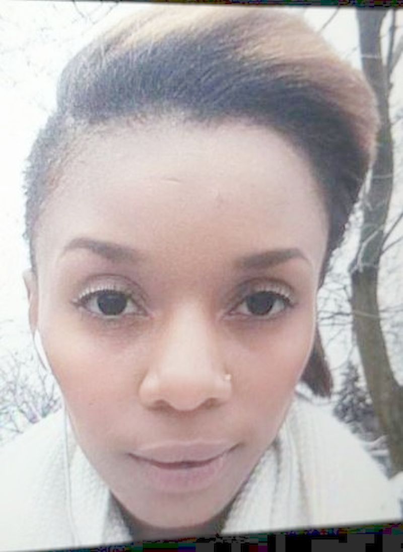 Photo of Faty Habimana who is missing. She is described as 5'5", 95 lbs, with short black hair and light-brown highlights. She was last seen wearing a violet head scarf, burgundy pants, and a black-and-white checkered sweater. She was also wearing a black Calvin Klein winter coat and blue boots.