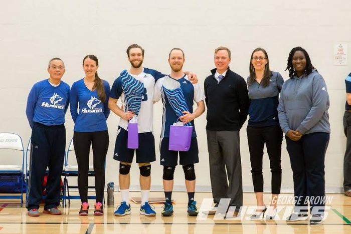 Huskies volleyball players Oscar Kahu and Josh Taylor, pictured here with GBC athletics staff, have been playing together since grade 8. Photo courtesy of George Brown College.