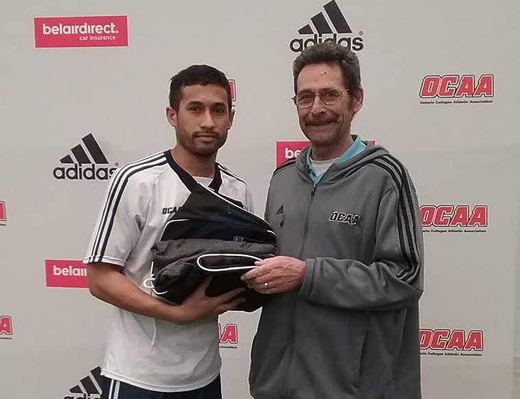 Jess Oliver accepts his OCAA all-star recognition