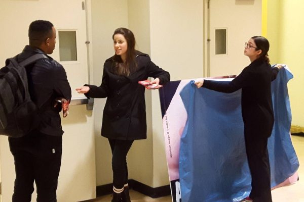 Anti-abortion activists have their signs covered up with a blanket inside George Brown College on April 3. Photo courtesy of Jonathon Van Maren