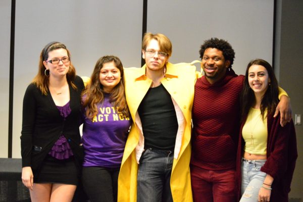 Act Now and V3 candidates pose for a picture at the end of the St. James debate. Photo by Steve Cornwell / The Dialog