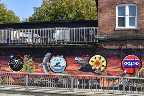 Anishinaabe, Wendat, Cree, and Haudenosaunee images make up the new mural at Spadina and Dupont. Photo: Steve Cornwell/The Dialog