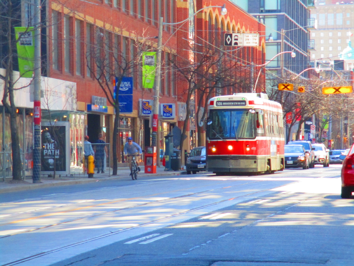 A TTC streetcar passes George Brown College. Photo: booledozer / Creative Commons