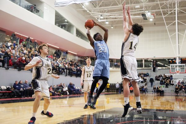 Khaled Djabo, centre, won the senior basketball league MVP while playing for JF Ross high school in Guelph. Photo: Kenneth Armstrong / GuelphToday.com used with permission