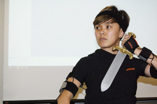 Thi Uyen My Nguyen, a Game Arts student at George Brown College, suits up in a XSENS motion capture suit at the School of Design. Photo: Leslie Gallagher / The Dialog