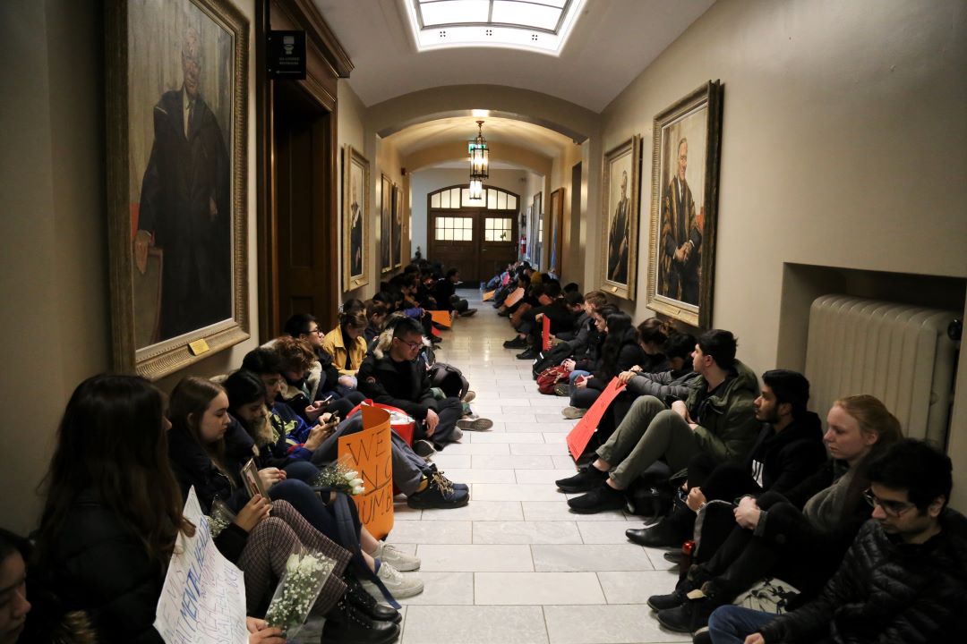 Students at the University of Toronto protest outside a Governing Council Business Board meeting demanding more support for mental health on campus. Photo: SHANNA HUNTER / THE VARSITY